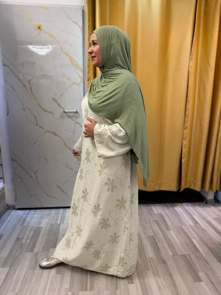 Dezent besticktes Kleid
